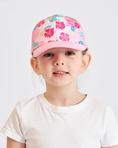 Close-up of kids pink baseball cap with tropical flower and pineapple print for summer