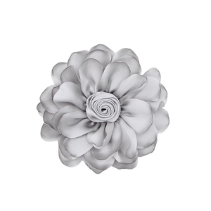 Detail of a handmade grey satin fabric rose flower with layered petals for accessories