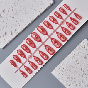 24pcs long coffin press on nails with cherry design and gold accents on pink base