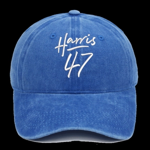 Detail of navy blue washed cotton baseball cap with white Harris 47 embroidery