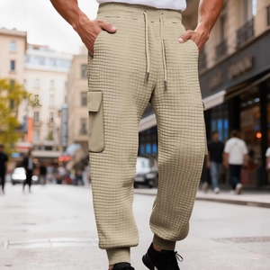 Men's khaki cargo joggers with side pockets and unique checkered textured fabric
