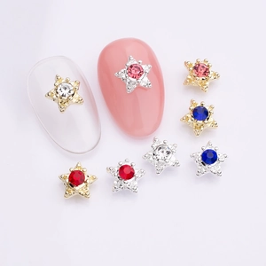 Star-shaped nail art charms with colorful rhinestones in gold and silver alloy base