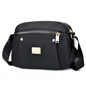 Classic black nylon crossbody shoulder bag for women with gold zippers and multi-pockets