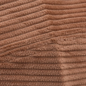 Close-up of coffee brown corduroy fabric texture with vertical stripes and soft fibers