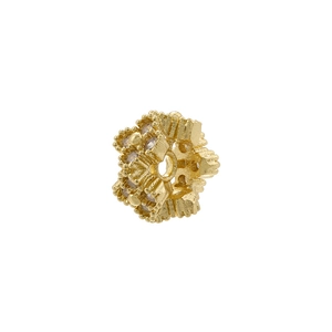 Macro shot of gold-plated flower spacer bead with cubic zirconia for DIY jewelry