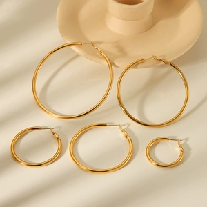 Set of five various sized 18K gold plated stainless steel hoop earrings for women