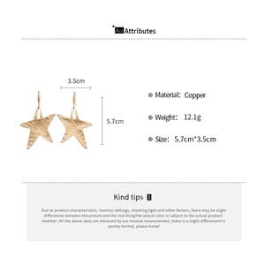 Detailed size and weight specs for gold plated brass star drop earrings with hammered texture