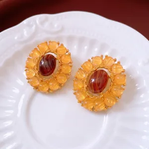 Vintage oval agate earrings with yellow bead halo and gold finish for women