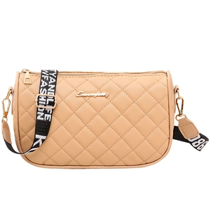 Khaki quilted PU leather crossbody bag with embroidered pattern and wide woven strap