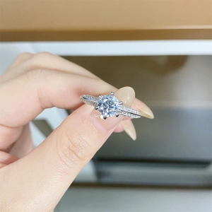 S925 sterling silver ring with classic six-prong moissanite setting and side accents