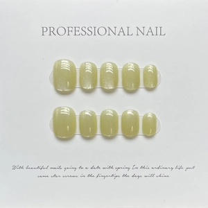 Short square mustard green cat eye press-on nails set with rainbow laser shimmer effect