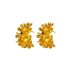 Elegant gold flower cluster C-shaped stud earrings in a polished metallic finish