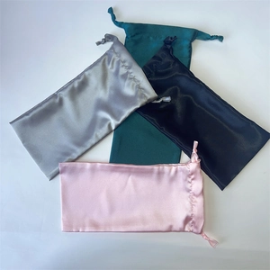 Silk sleep mask storage bags in grey, green, black and pink with smooth satin finish