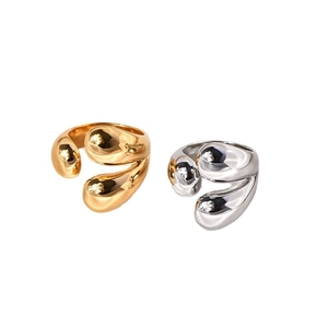 Adjustable minimalist geometric ring in gold and silver with liquid metal texture finish