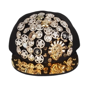 Punk hip-hop baseball cap with gold studs and mirrored brim featuring sun god emblem