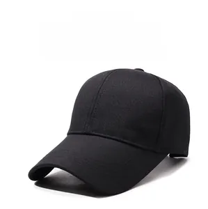 Detailed macro view of the SPORTS metal emblem on a black breathable baseball cap
