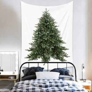 Close-up of bohemian Christmas tree tapestry with warm yellow light effects on white wall