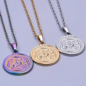 Detailed view of Greek owl coin pendants in rainbow, gold, and silver finishes