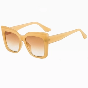 Detail shot of jelly tea square oversized sunglasses with brown gradient lenses
