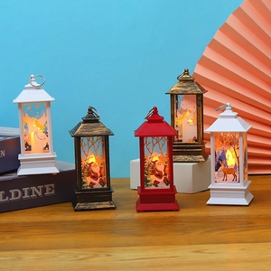 Set of Christmas decorative lanterns with LED warm lights and festive holiday patterns