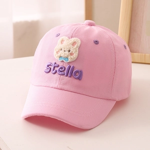Detailed plush bunny embroidery and Stella lettering on pink cotton children baseball cap