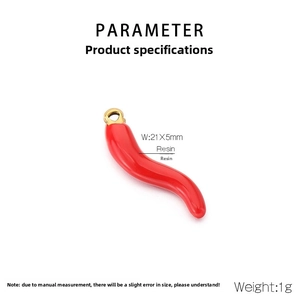 Macro view of a 21x5mm red resin chili pendant with a gold loop for DIY jewelry