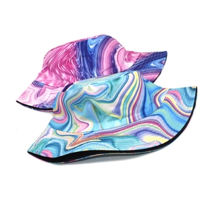 Tie-dye bucket hats with vibrant fluid marble patterns for sun protection and outdoor style