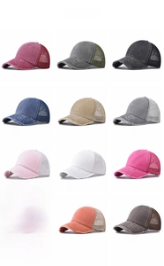 Detailed color display grid of 12 distressed mesh baseball caps in washed cotton fabric