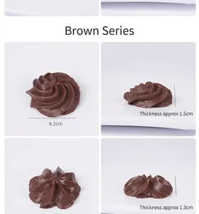 Detail of dark brown faux cookie models with diameter 4.2cm and various thickness