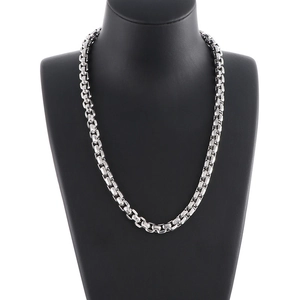 Silver stainless steel box chain necklace for men displayed on a black mannequin bust