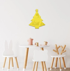 Macro view of gold acrylic Christmas tree wall mirror sticker in children's bedroom decor