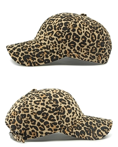 Detail view of leopard print baseball cap with adjustable metal buckle strap and cotton texture