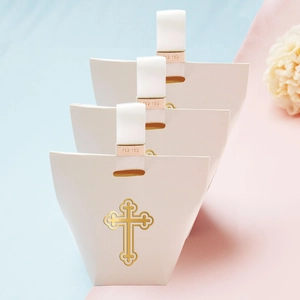 Three white cross candy gift boxes with rose gold FOR YOU buckles and white ribbons