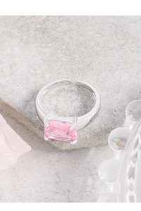 Detailed shot of a rectangular pink zircon stone on a 925 sterling silver adjustable ring