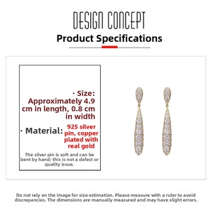 Detailed view of long gold-plated teardrop earrings with 925 silver needles and crystals