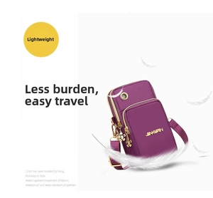 Detail of a lightweight purple nylon phone bag featuring three layers and water-repellent fabric