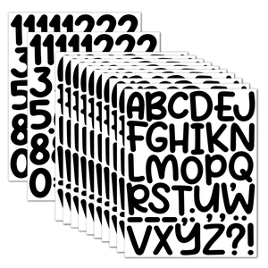 Detailed stack of 2-inch black vinyl waterproof uppercase letter and number stickers