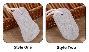 Close-up of foot pumice stones in oval and foot shapes with white hanging ropes