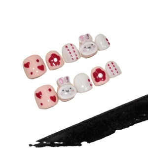 Handmade pink press-on nails for kids featuring cute 3D bunny and heart cartoon patterns