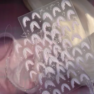 Detail of MS 783 nail art stickers with purple lace and ribbon bow designs