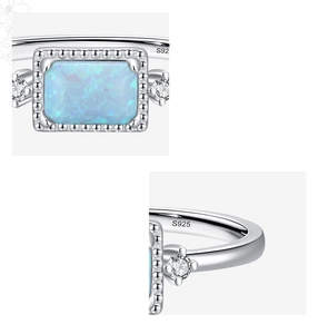 Macro detail of S925 sterling silver ring featuring blue opal and engraved hallmark