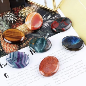 Pierres de pouce ovales en cristal naturel poli incluant œil de tigre et labradorite