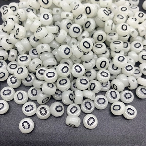 Glow-in-the-dark acrylic letter beads with black O characters for DIY jewelry making