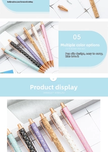 Detailed view of retractable ballpoint pens with rose gold clips and cork texture patterns