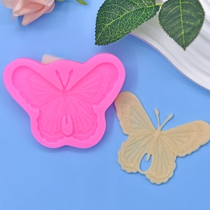 Pink butterfly silicone mold for DIY baking and resin crafts with realistic textures