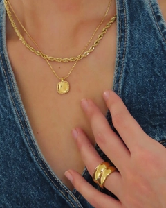 Close-up of 18K gold-plated wide textured ring and chunky chain necklace set