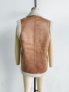 Back view of brown faux suede vest with soft sherpa lining and ivory collar detail