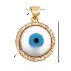 Detail view of Evil Eye charm with natural shell, zircon inlay, 16mm diameter size
