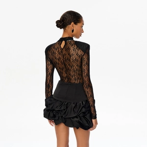 Detail of black lace long sleeve bodysuit with elegant back cutout and high neck design