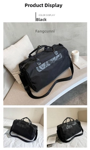 Detail of black nylon fitness bag with reinforced leather handles and adjustable strap